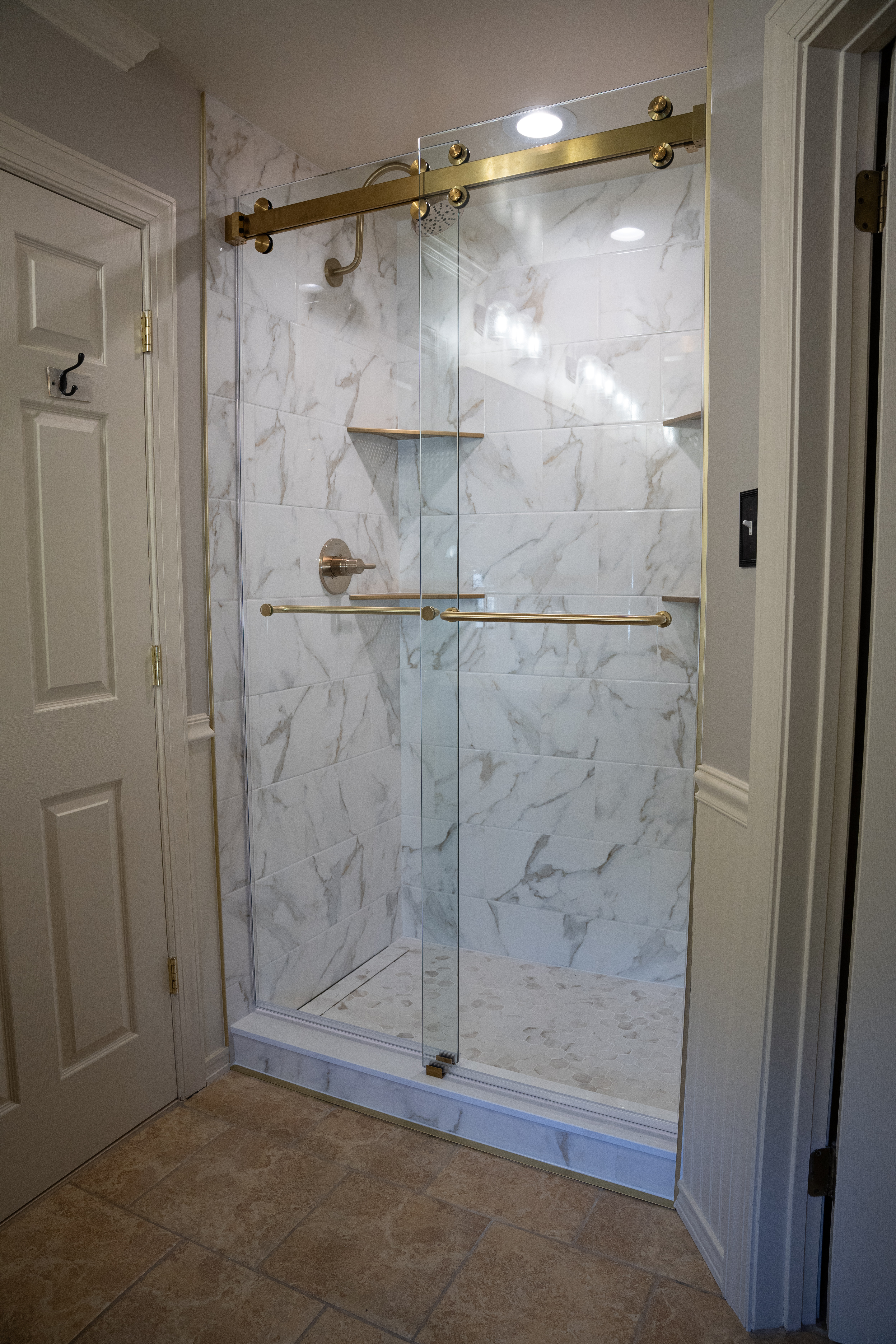 Glass shower panel and door detail view